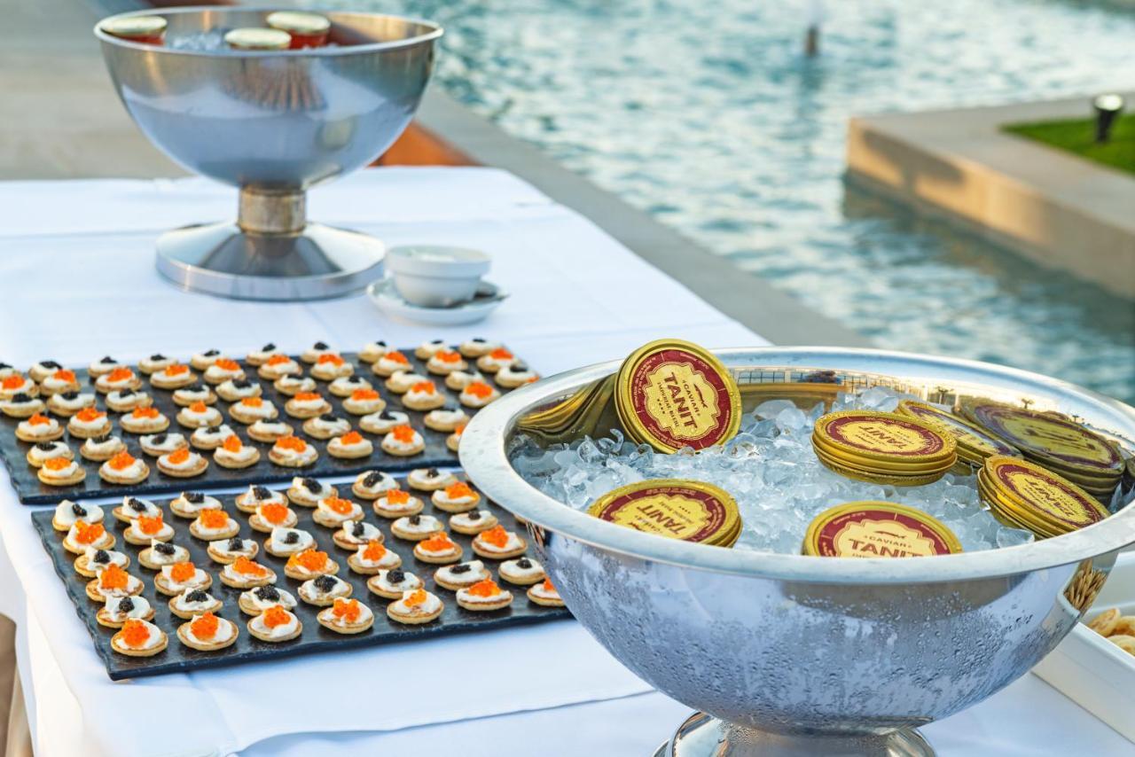 Cabogata Beach Hotel Retamar  Exteriör bild Caviar and chips at a party